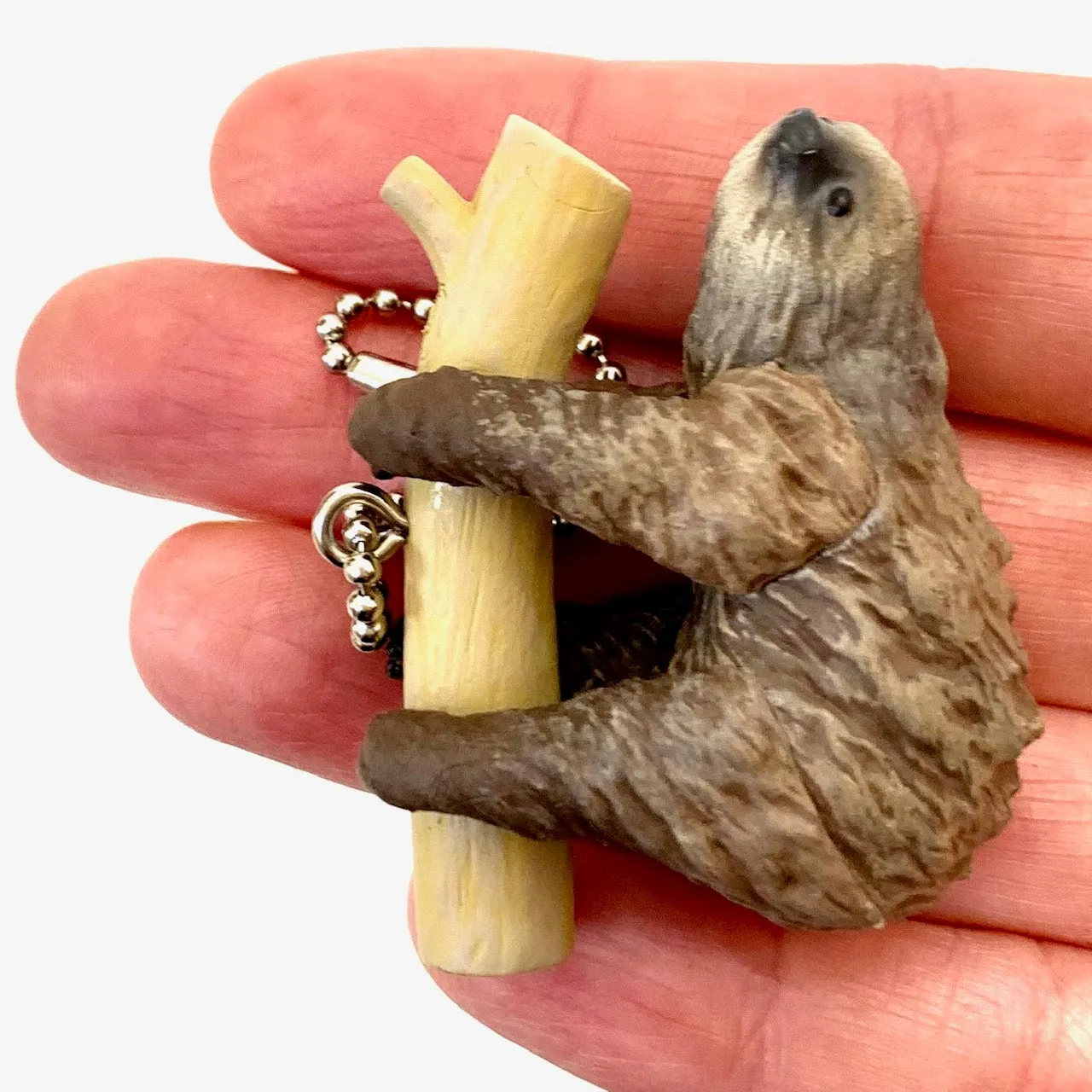 X 70839 SLOTH CHARM CAPSULE-DISCONTINUED