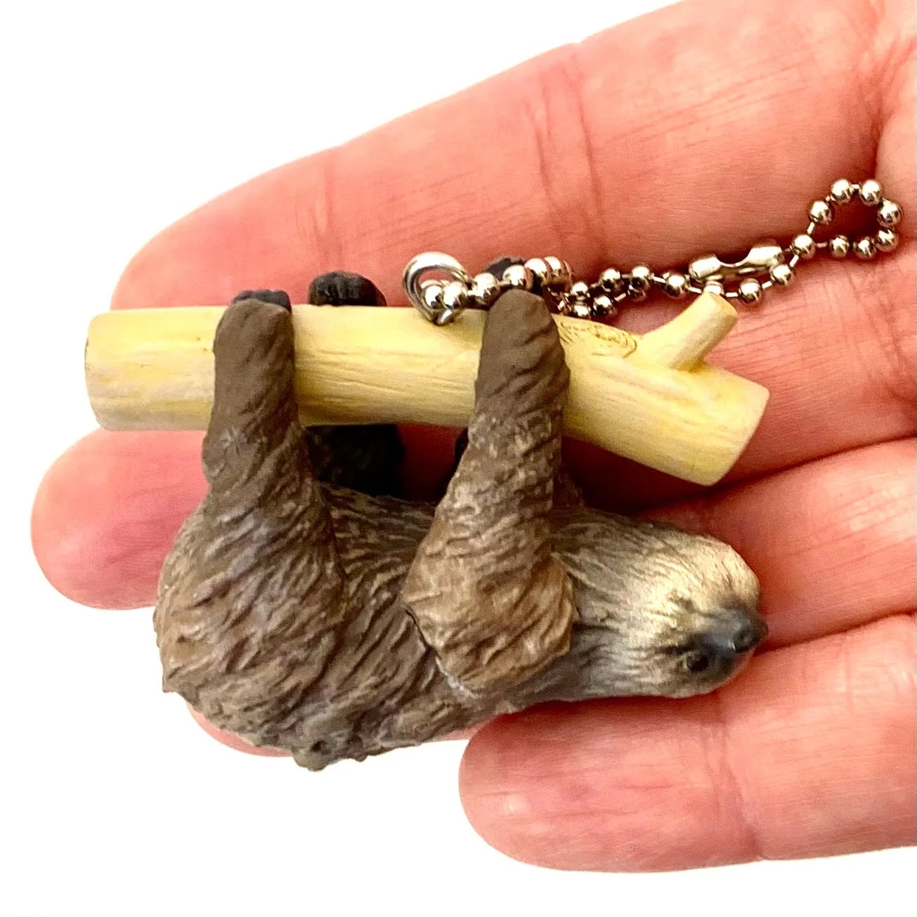 X 70839 SLOTH CHARM CAPSULE-DISCONTINUED