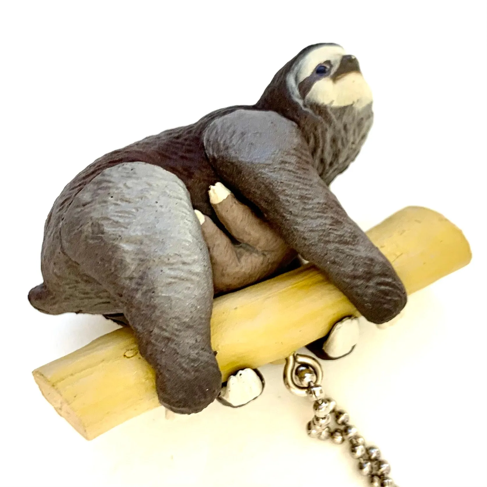 X 70839 SLOTH CHARM CAPSULE-DISCONTINUED