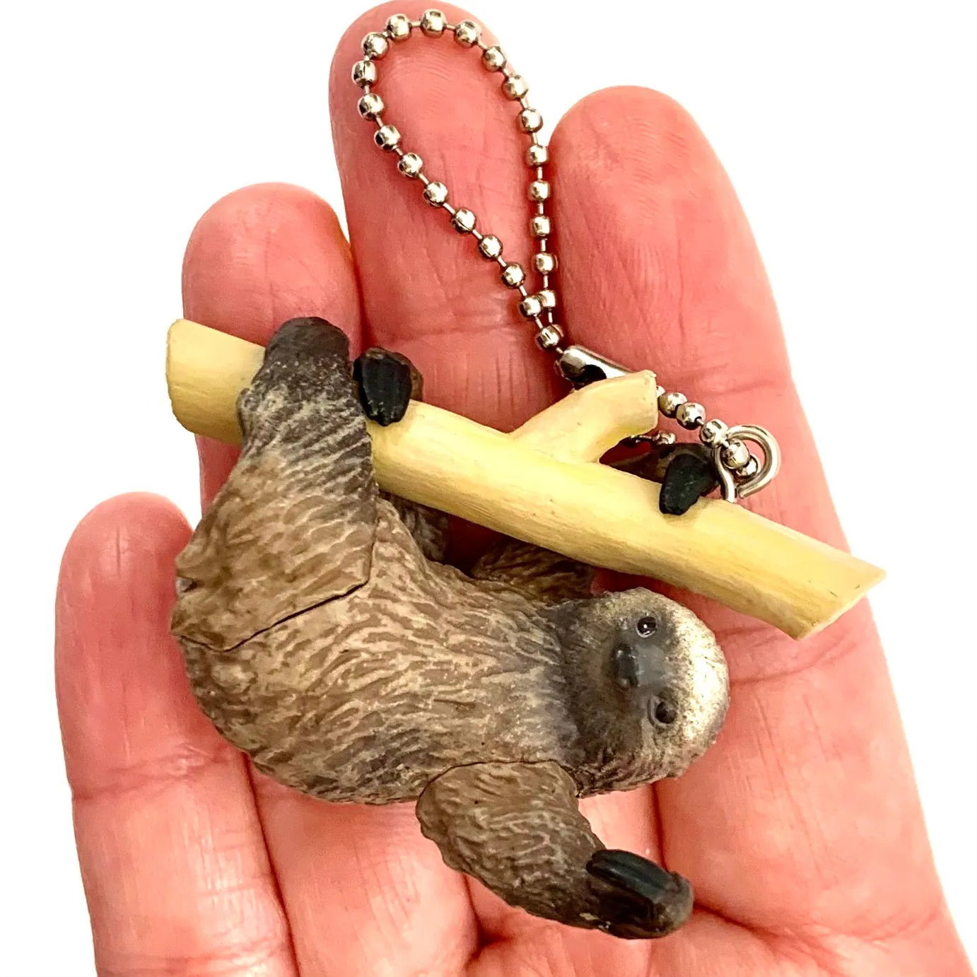 X 70839 SLOTH CHARM CAPSULE-DISCONTINUED