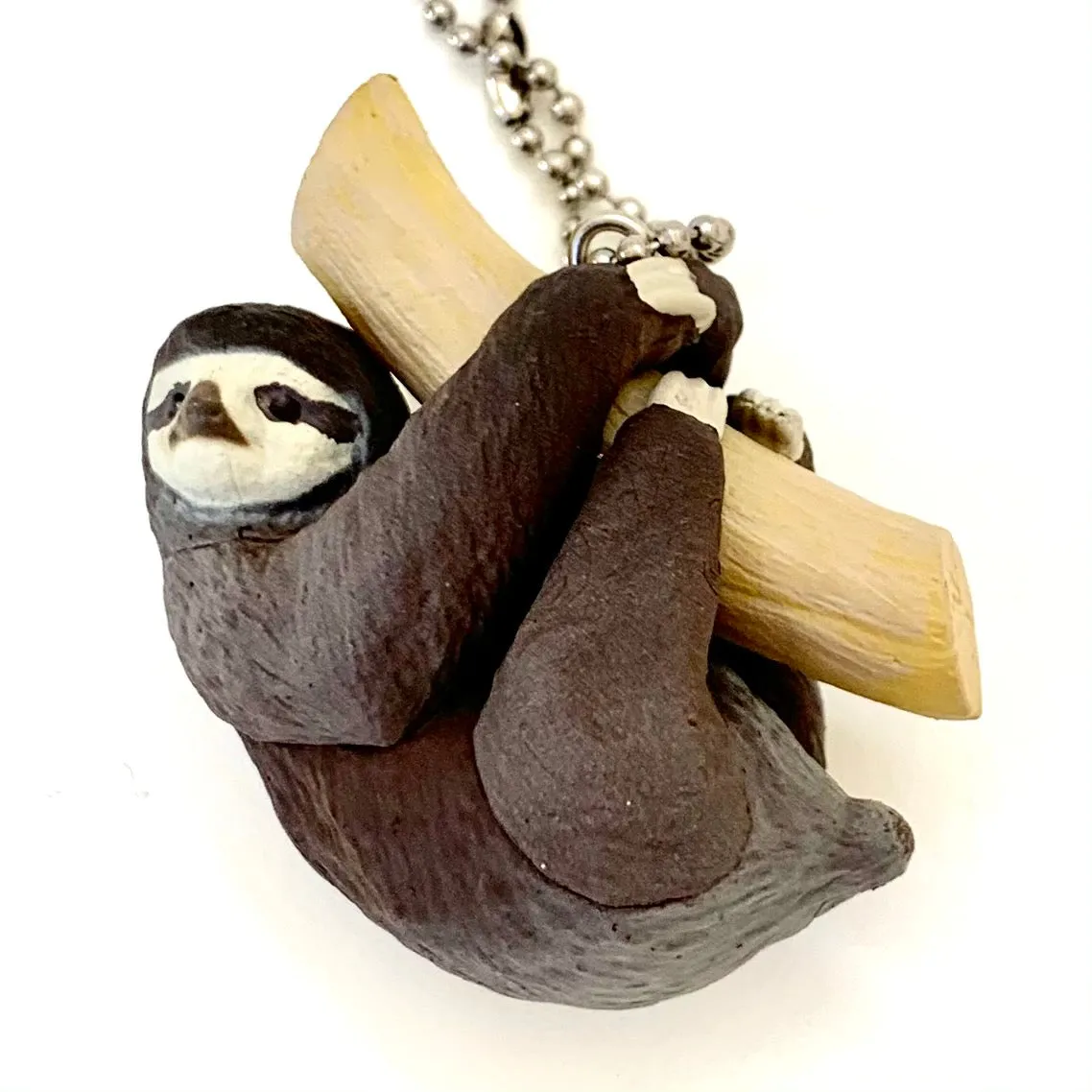 X 70839 SLOTH CHARM CAPSULE-DISCONTINUED