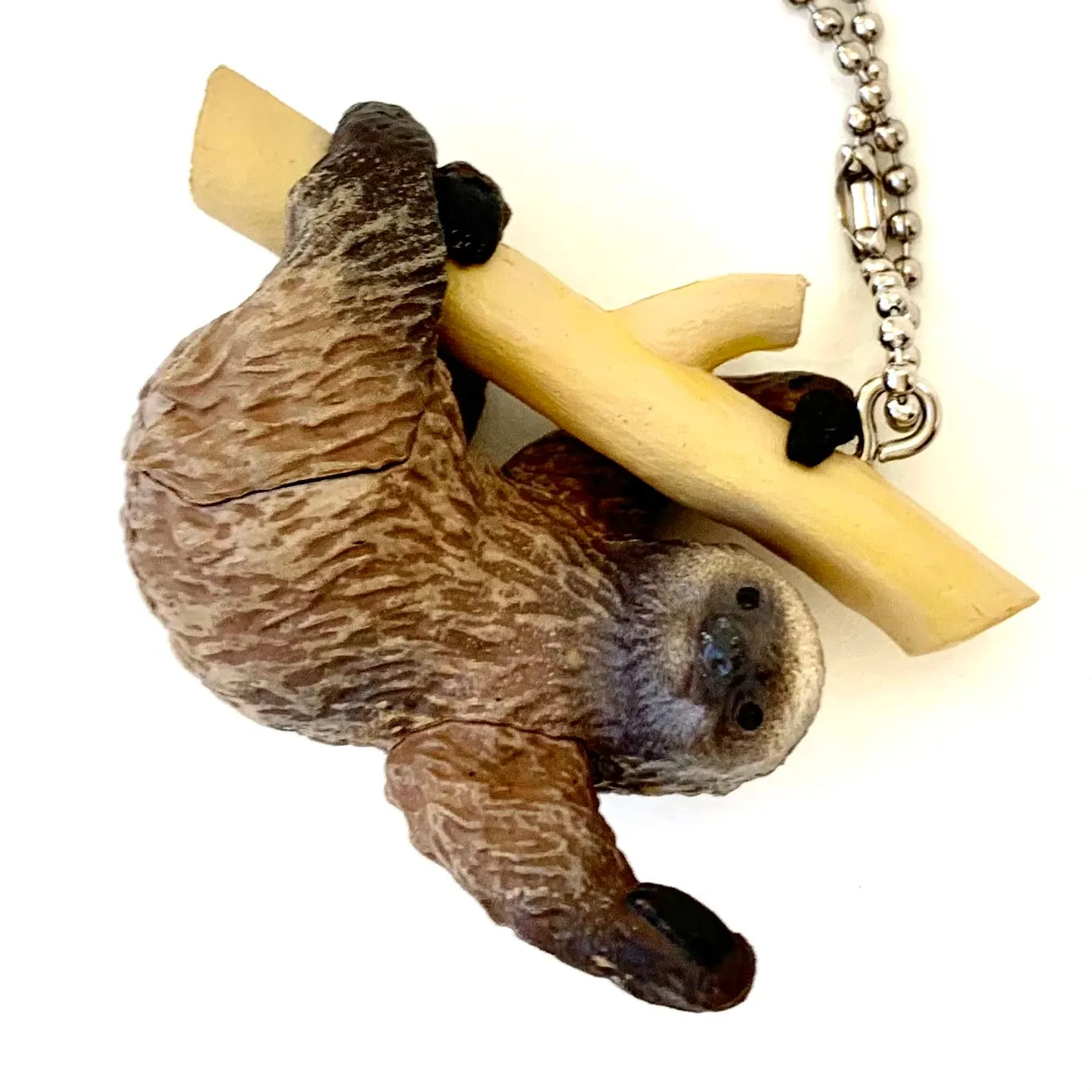 X 70839 SLOTH CHARM CAPSULE-DISCONTINUED