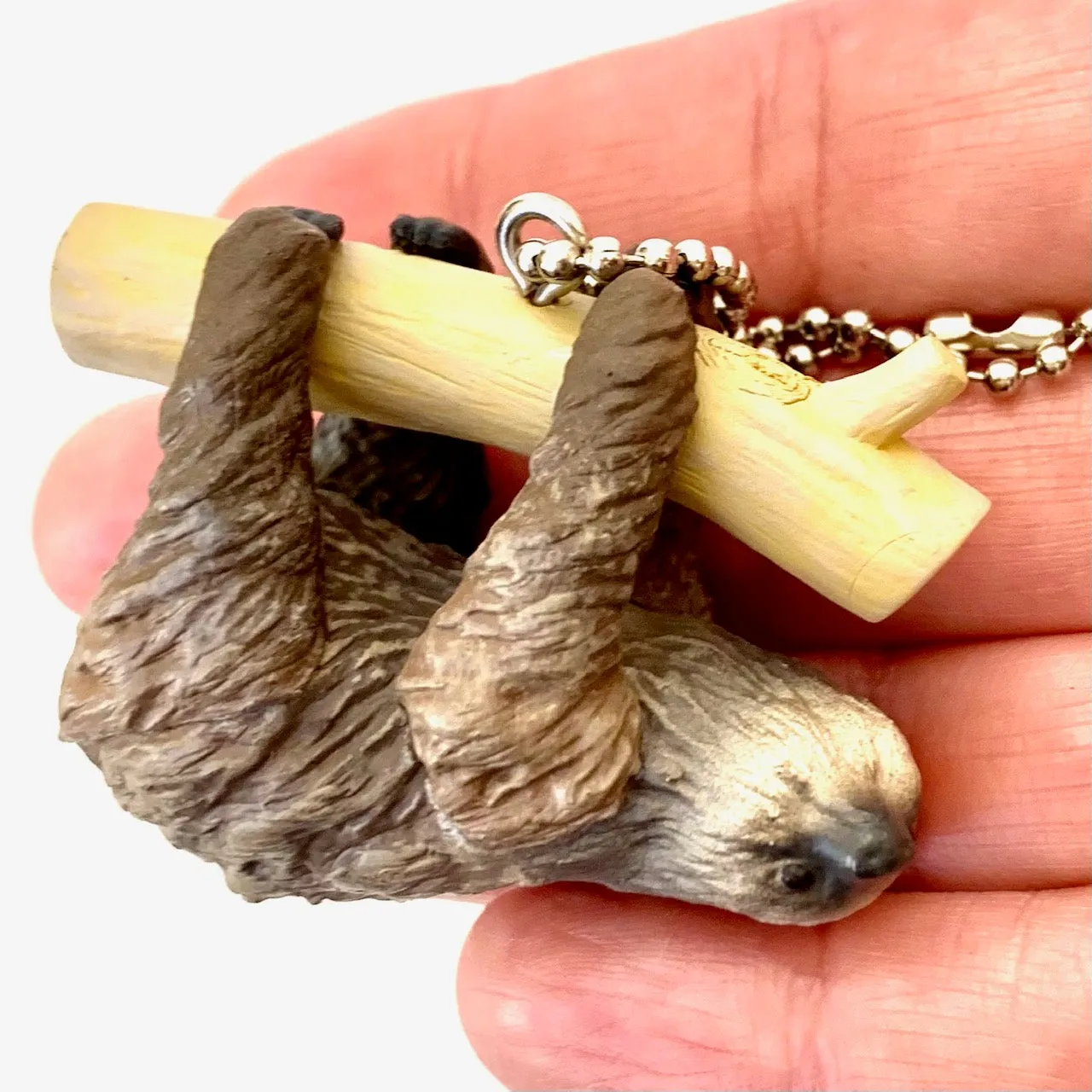 X 70839 SLOTH CHARM CAPSULE-DISCONTINUED