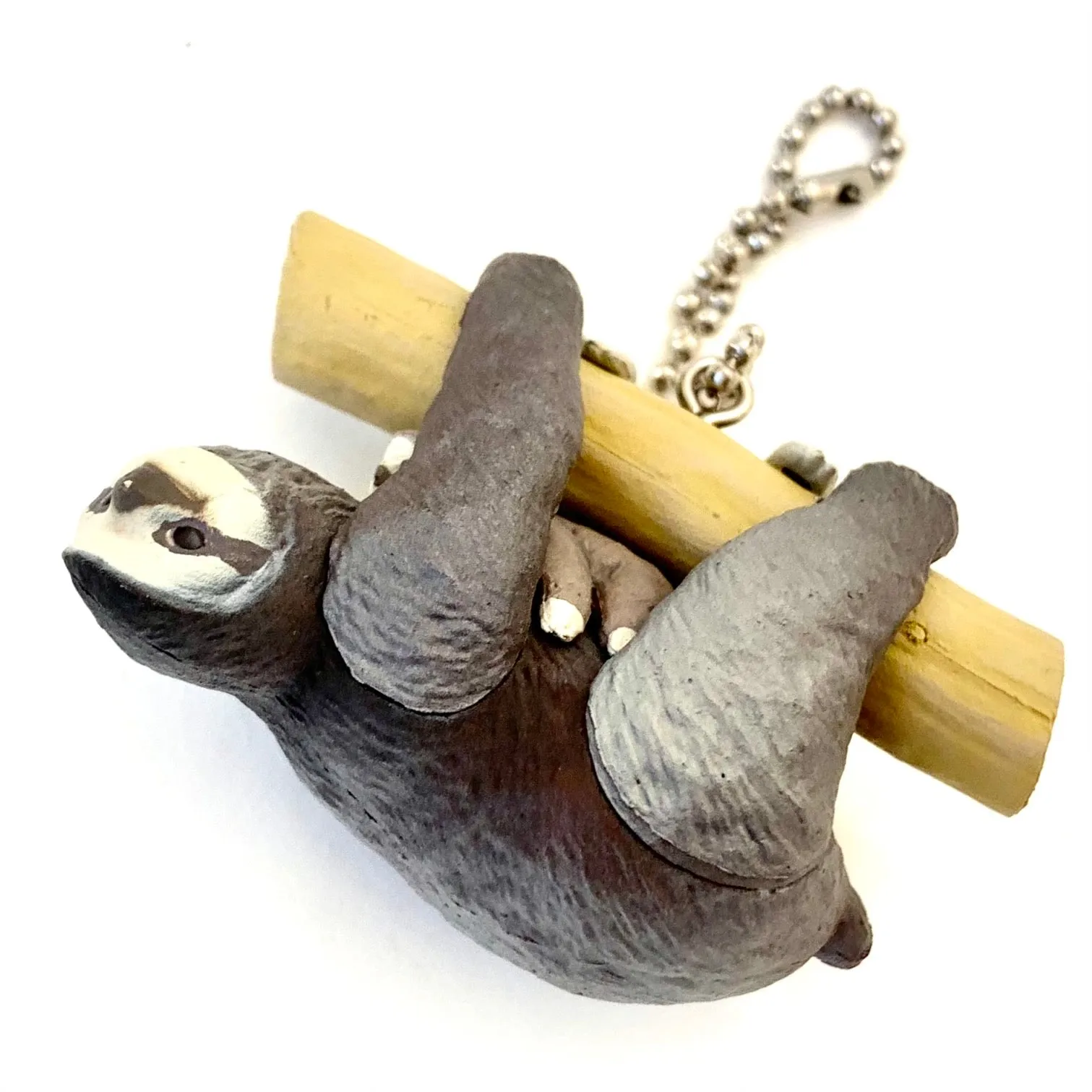 X 70839 SLOTH CHARM CAPSULE-DISCONTINUED