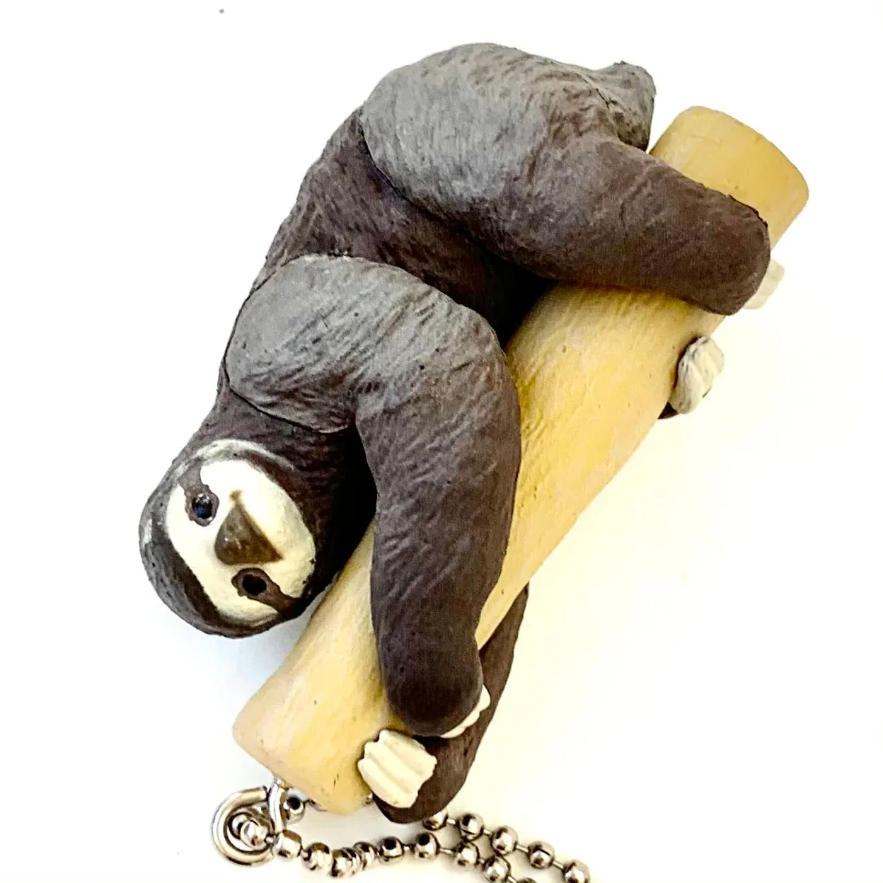 X 70839 SLOTH CHARM CAPSULE-DISCONTINUED