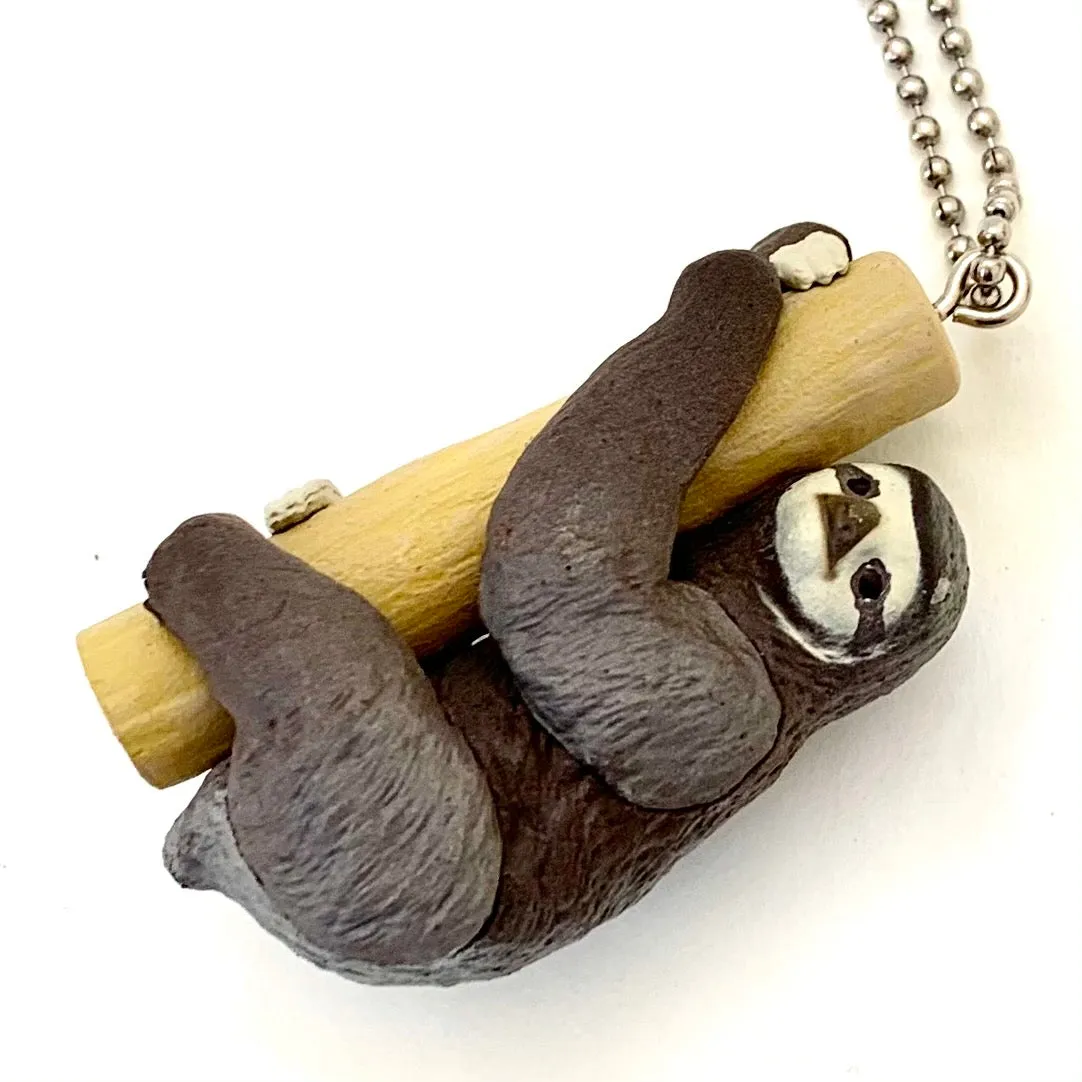 X 70839 SLOTH CHARM CAPSULE-DISCONTINUED