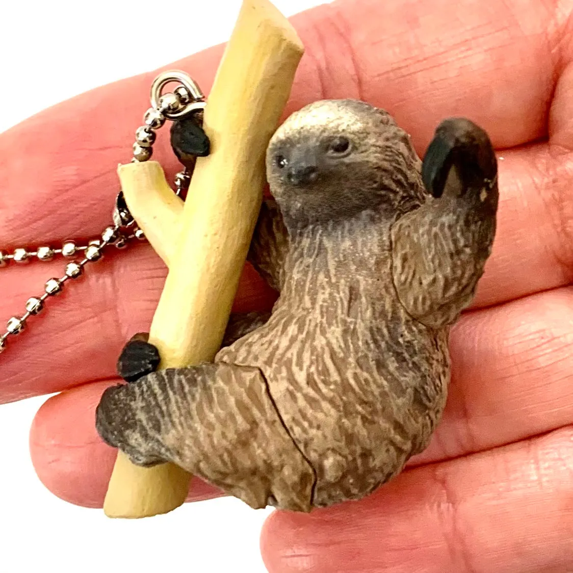 X 70839 SLOTH CHARM CAPSULE-DISCONTINUED