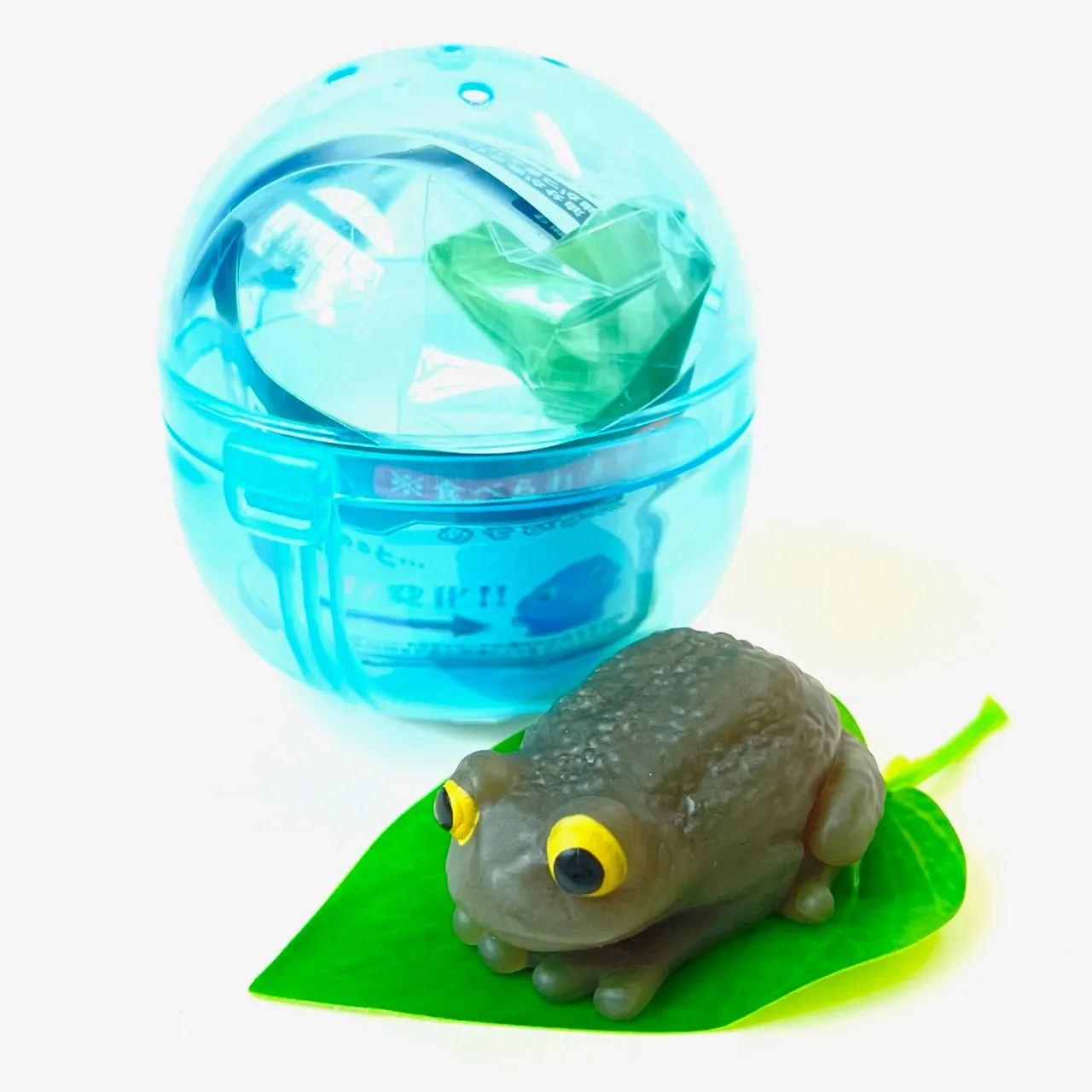 X 70955 Frog  Color Changing Gummy Figurine Capsule-DISCONTINUED