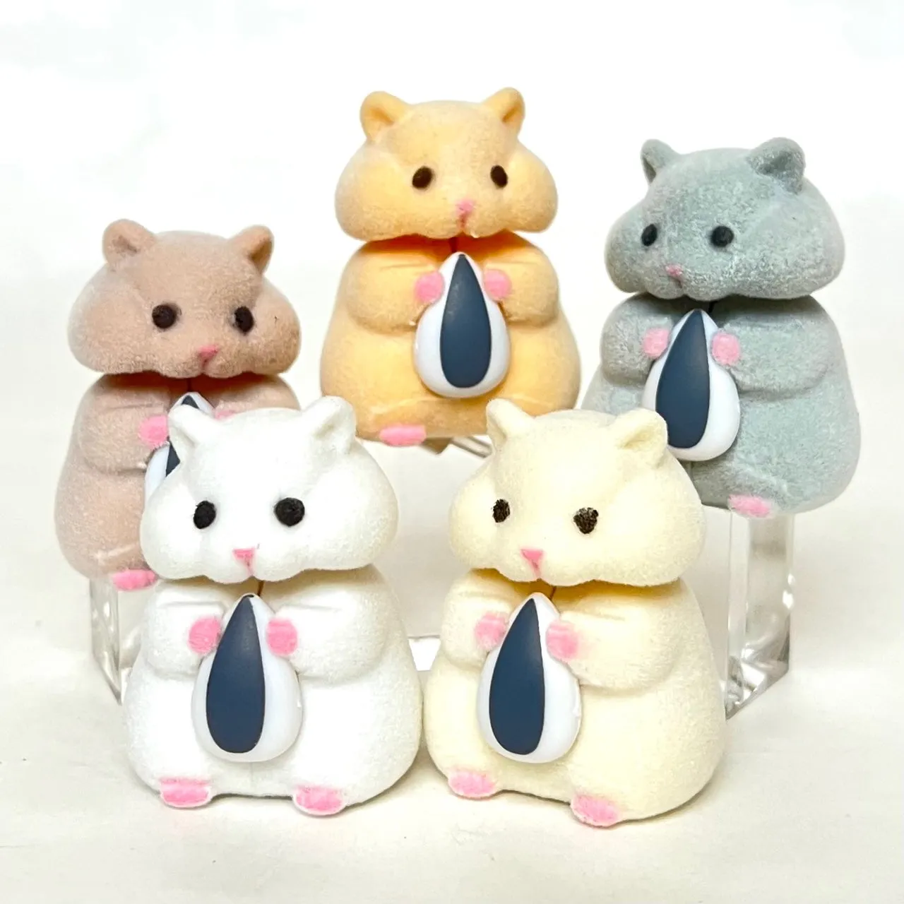 X 70973 Hamster with Seed Figurine Capsule-DISCONTINUED