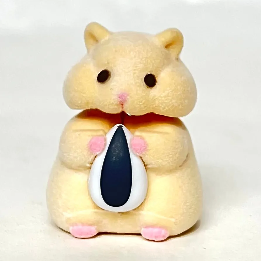 X 70973 Hamster with Seed Figurine Capsule-DISCONTINUED